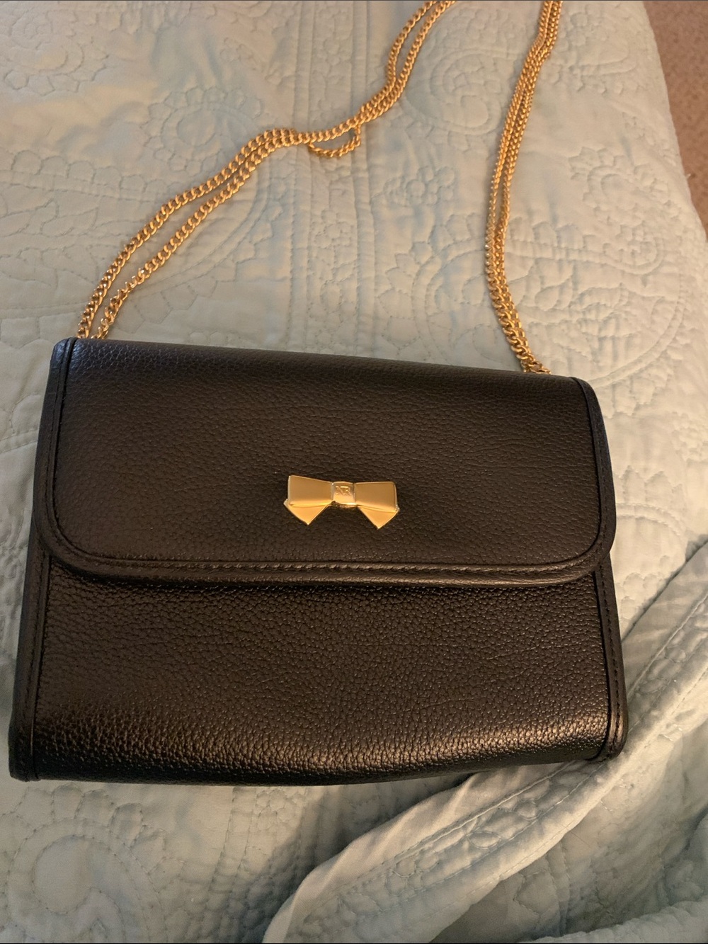 Nina Ricci Black Leather Crossbody Bag with Gold Bow Detail